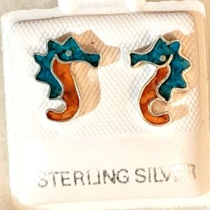 Unique sterling silver  seahorse stud earrings.